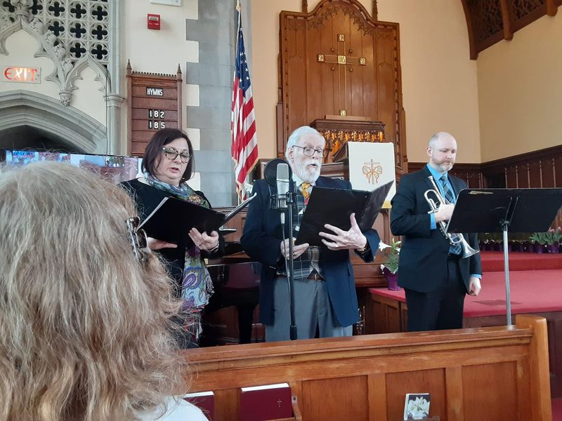 The choir singing during worship