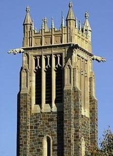 The top of the bell tower with its pinnacles and grotesques